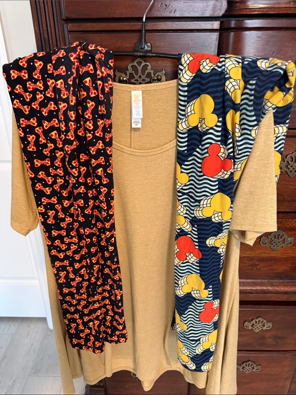 Lularoe tunic with two Disney Leggings